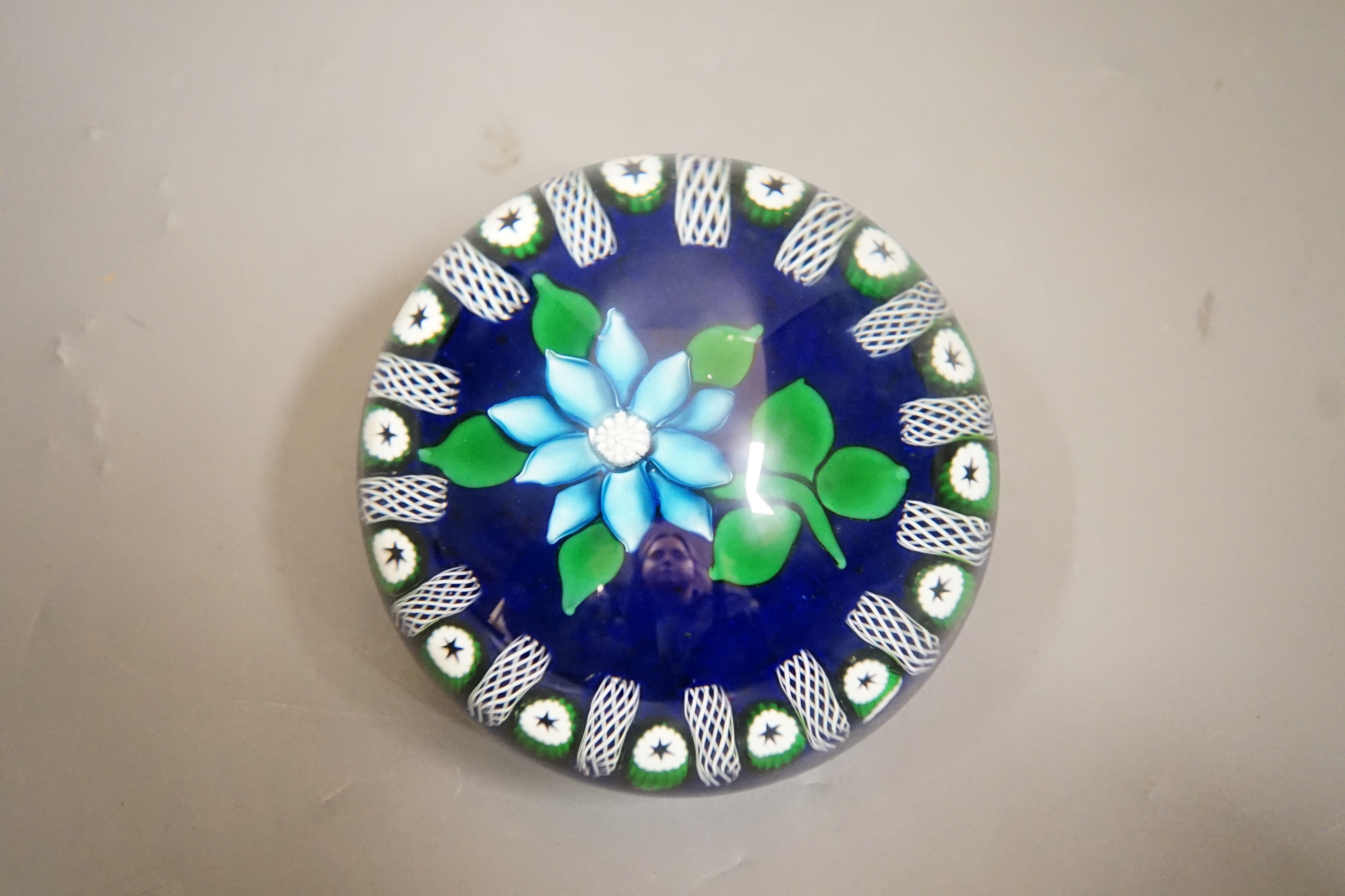 A John Deacon blue clematis paperweight, JHD 1998 cane rod